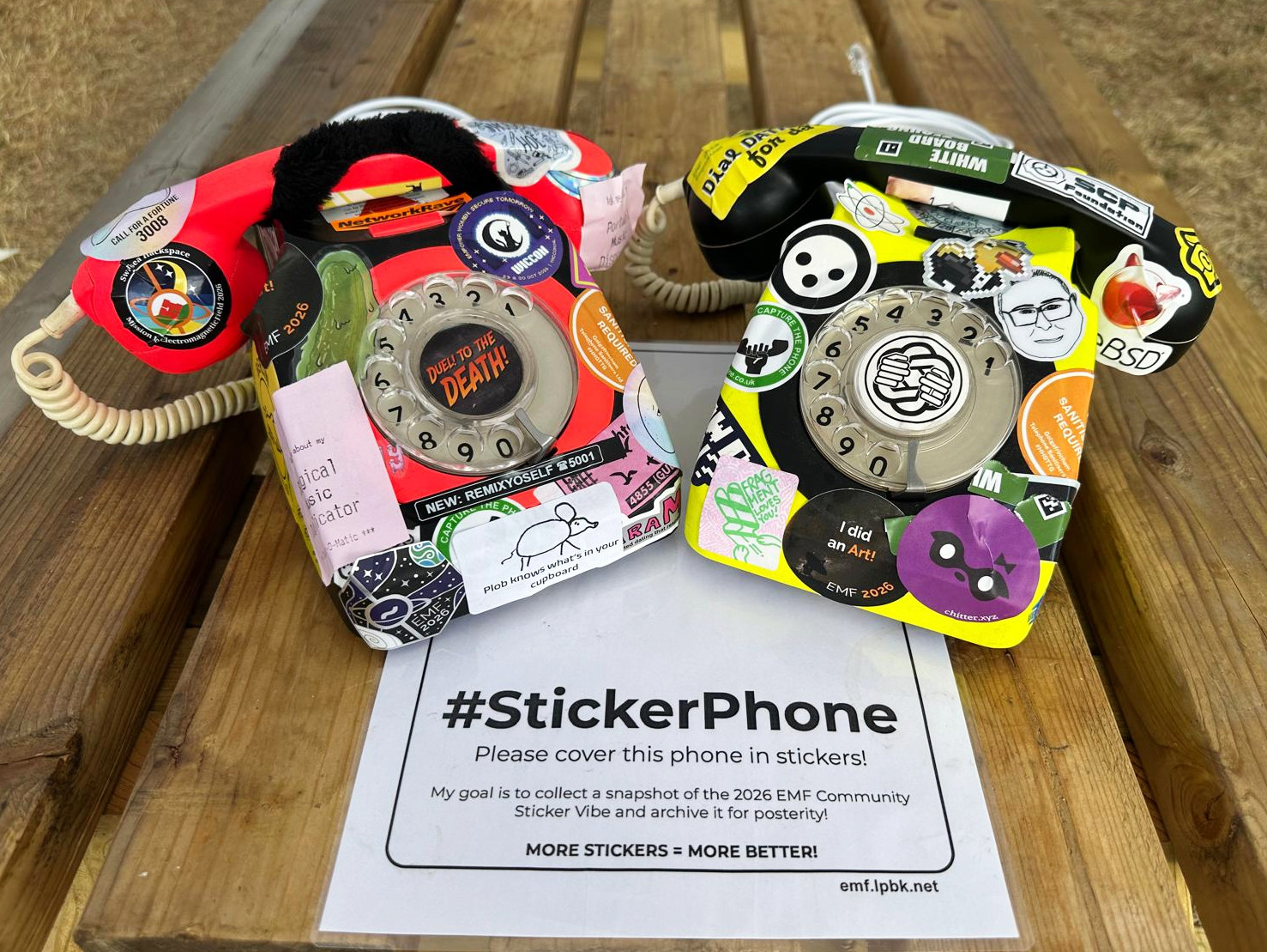 Two GPO 746 phones, covered in stickers